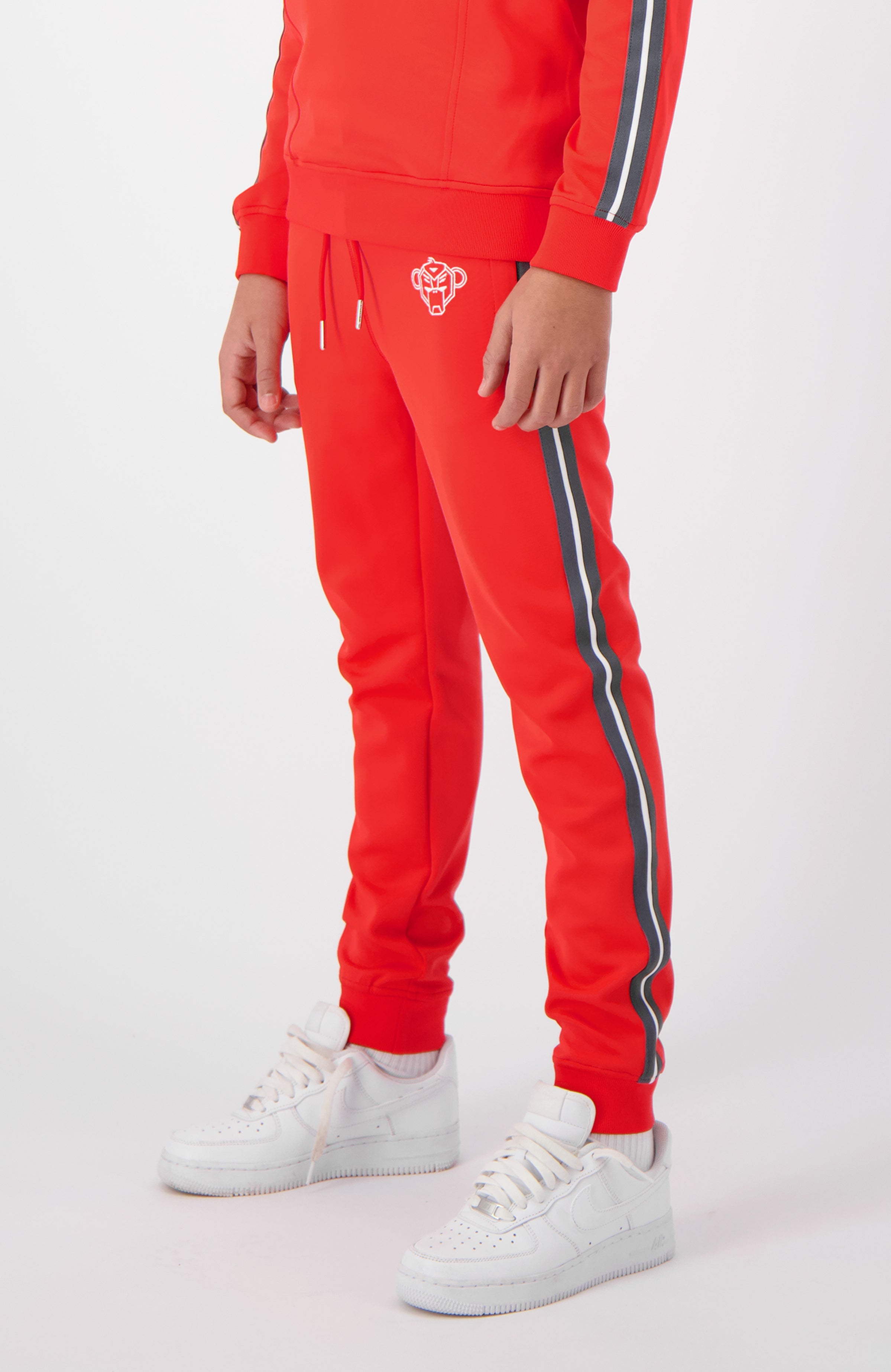 JR. TAPED TRACKPANTS | Neon Rood