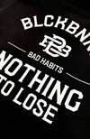 BAD HABITS ZIPPED HOODIE | Zwart